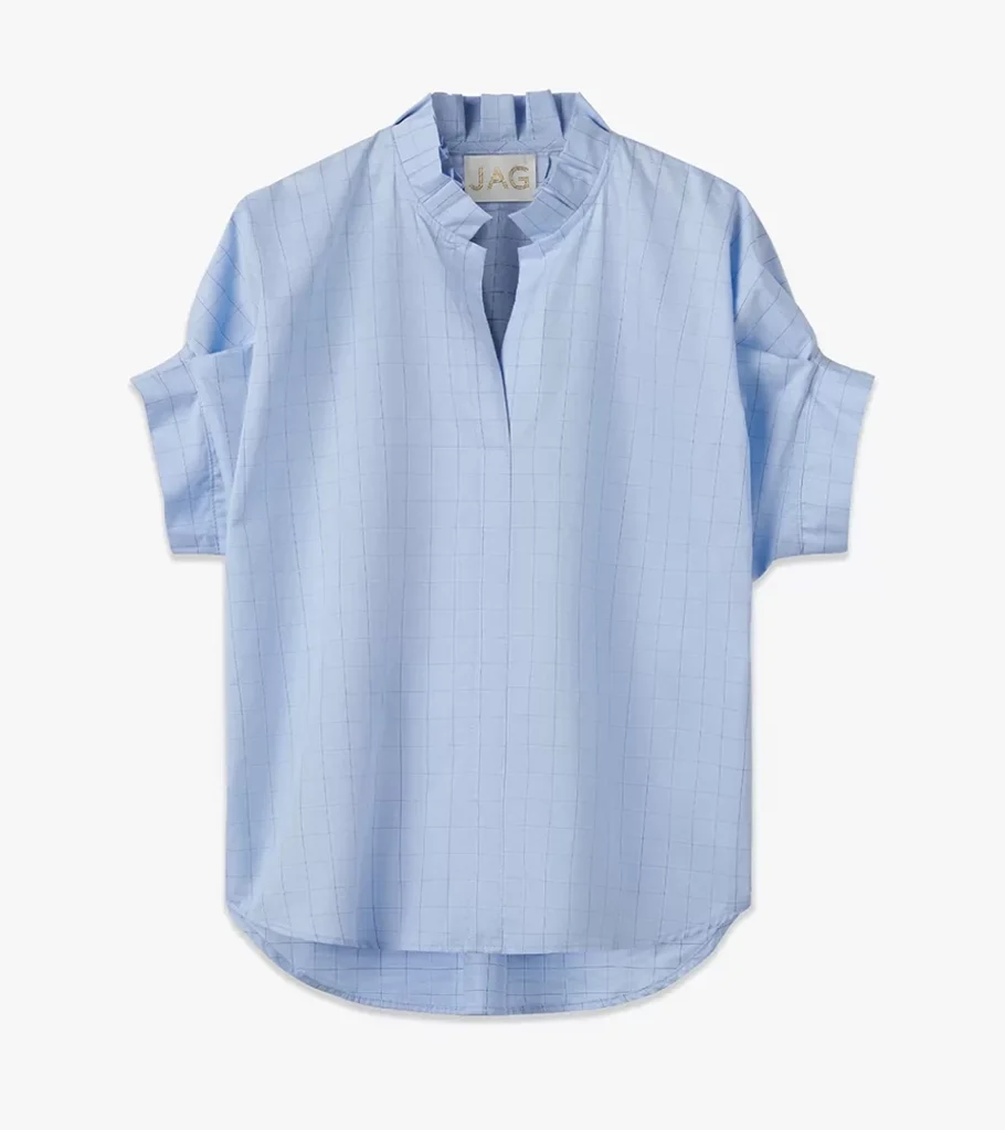 Flat lay photography of a light blue band-collar popover blouse