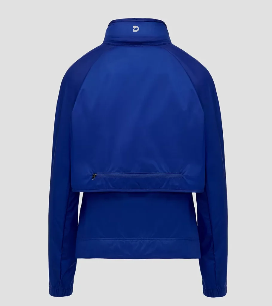 Ghost mannequin photography of a royal blue jacket, back view showing layered hem
