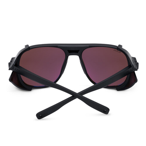 Folded black glacier sunglasses with photochromic lenses photographed on white