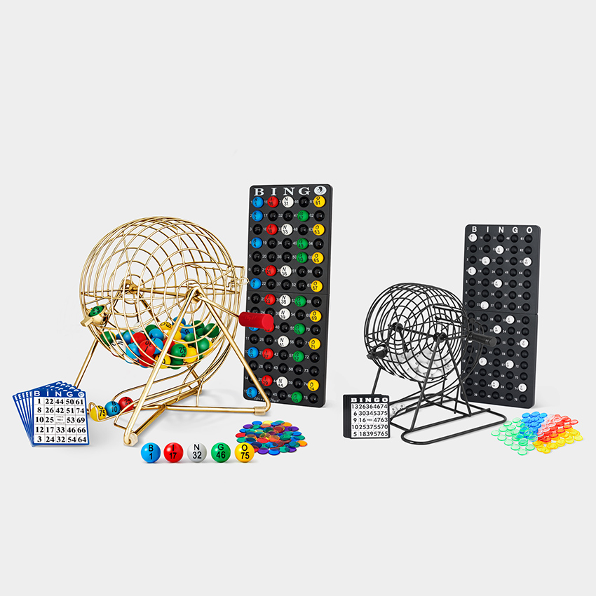 Amazon product photography of two bingo cage sets in gold and black with boards, cards, and chips