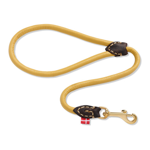 Mustard yellow rope dog leash photographed on white background