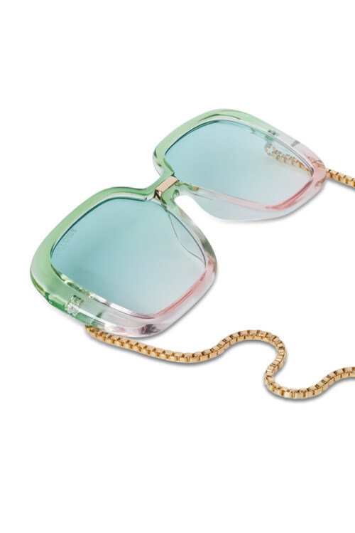 Pastel green fashion sunglasses with chain photographed on white background