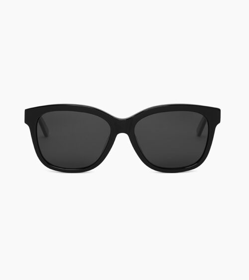 Sunglasses product photography of black acetate sunglasses shot straight-on with a wide rounded frame and grey lenses