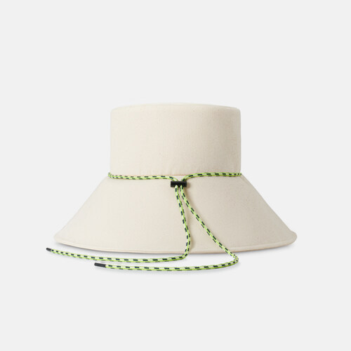 Product photography of a cream bucket hat with a neon green and black chin cord