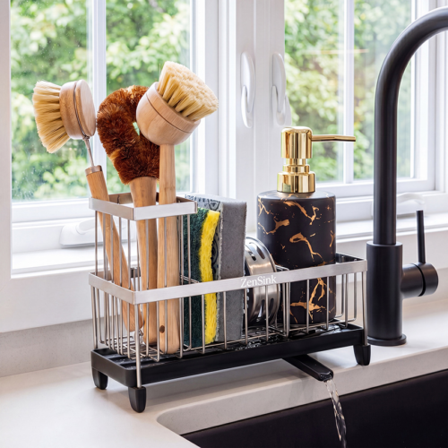 Professional lifestyle product photography for Amazon showing a stainless steel sink organizer in a natural kitchen setting with cleaning accessories.