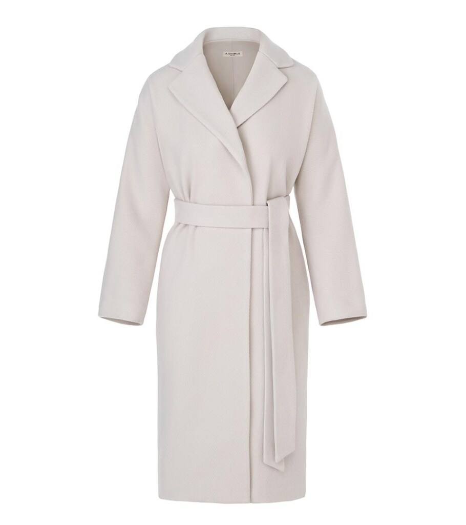 Ghost mannequin product photography of an ivory belted wrap coat, showcasing the tailored silhouette, clean lines, and invisible mannequin effect for luxury outerwear photography.