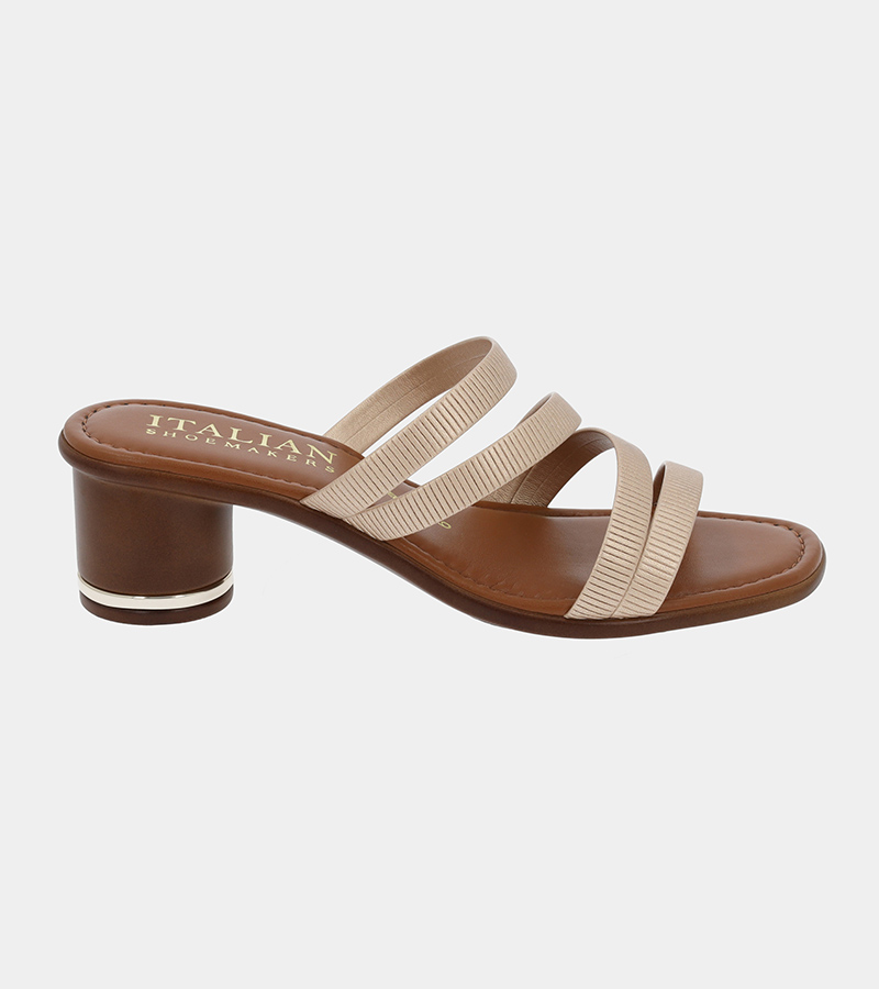 Automated product photography of a tan leather block-heel slide sandal, angled profile view showing the heel and footbed