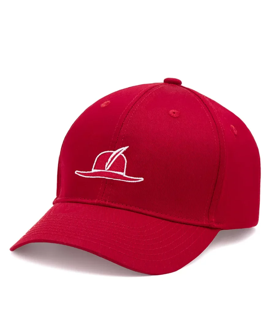 Product photography of a red baseball cap with a white embroidered line-art design, angled view