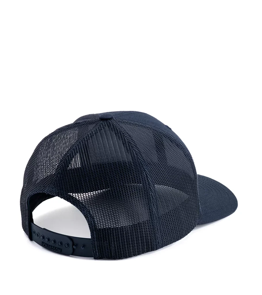 Product photography of a navy mesh trucker cap from behind, showing the snapback closure