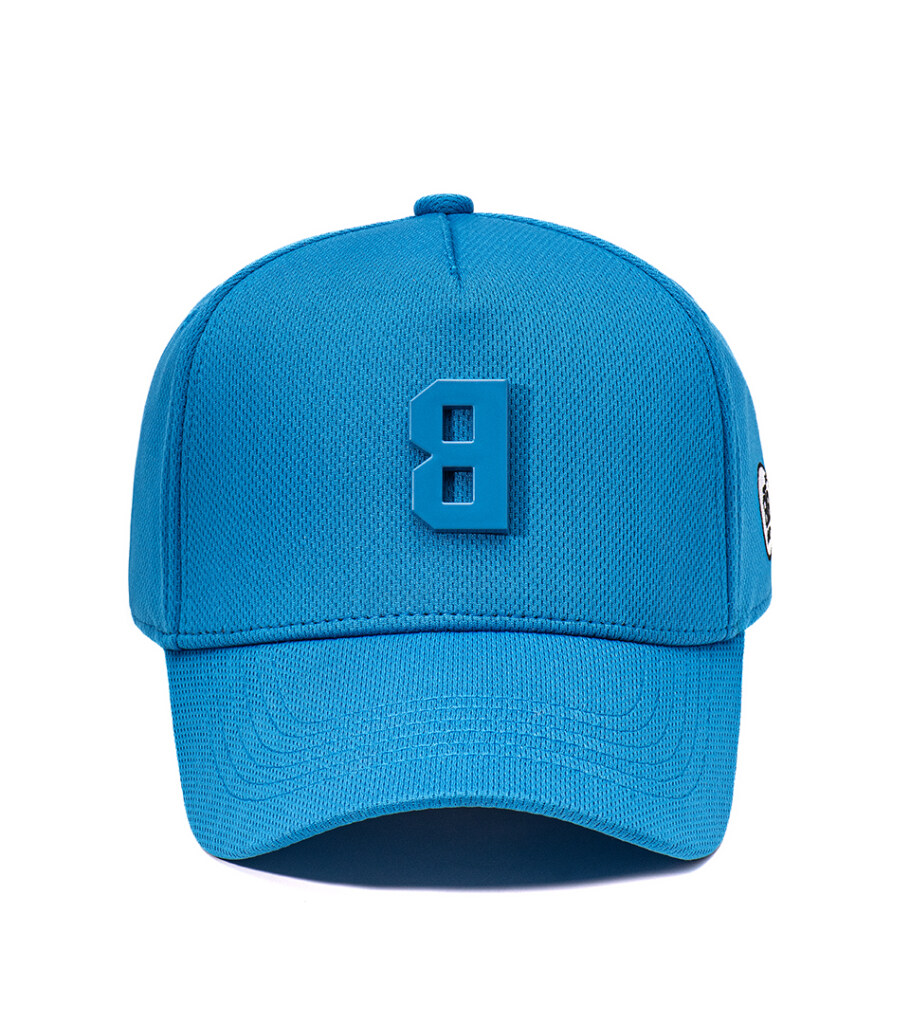 Product photography of a bright blue baseball cap with a raised tonal logo, front view