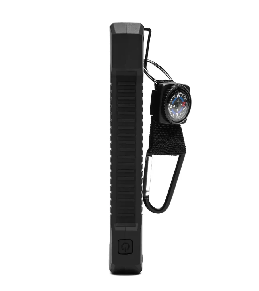 Product photography of a black rugged power bank with carabiner, edge-on profile view showing thickness