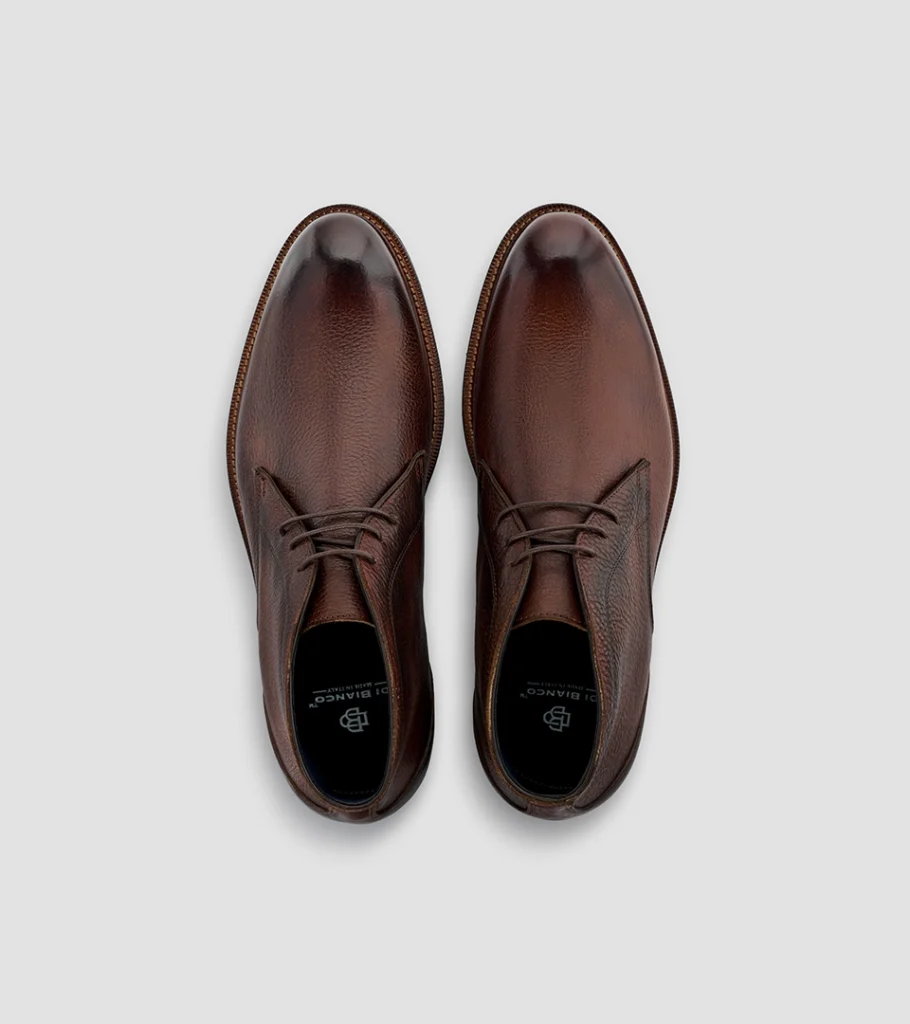 Shoe product photography of a pair of burgundy leather derby shoes shot from directly overhead