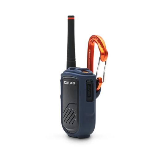 Product photography of a navy handheld two-way radio with an orange antenna and carabiner clip, front view