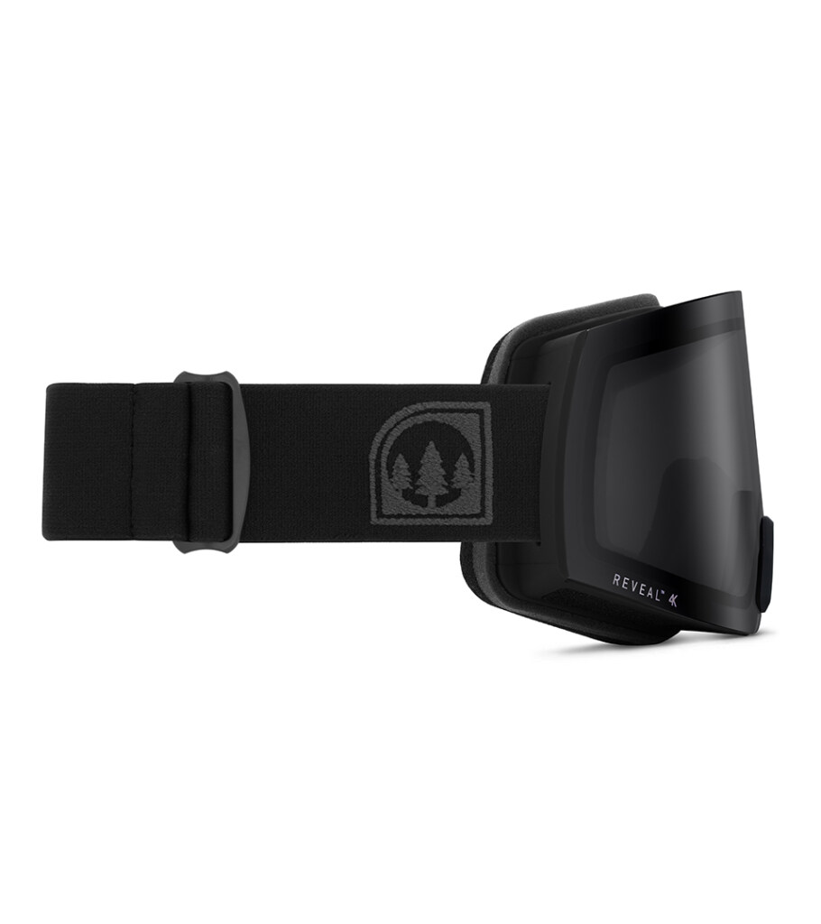 Product photography of black snow goggles showing the strap clip and foam edge, angled side view