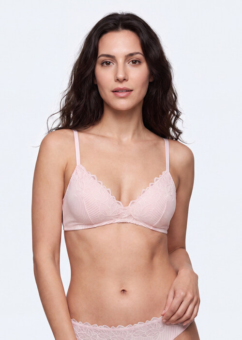 AI model photography of a pale pink lace bralette, front view on a white background