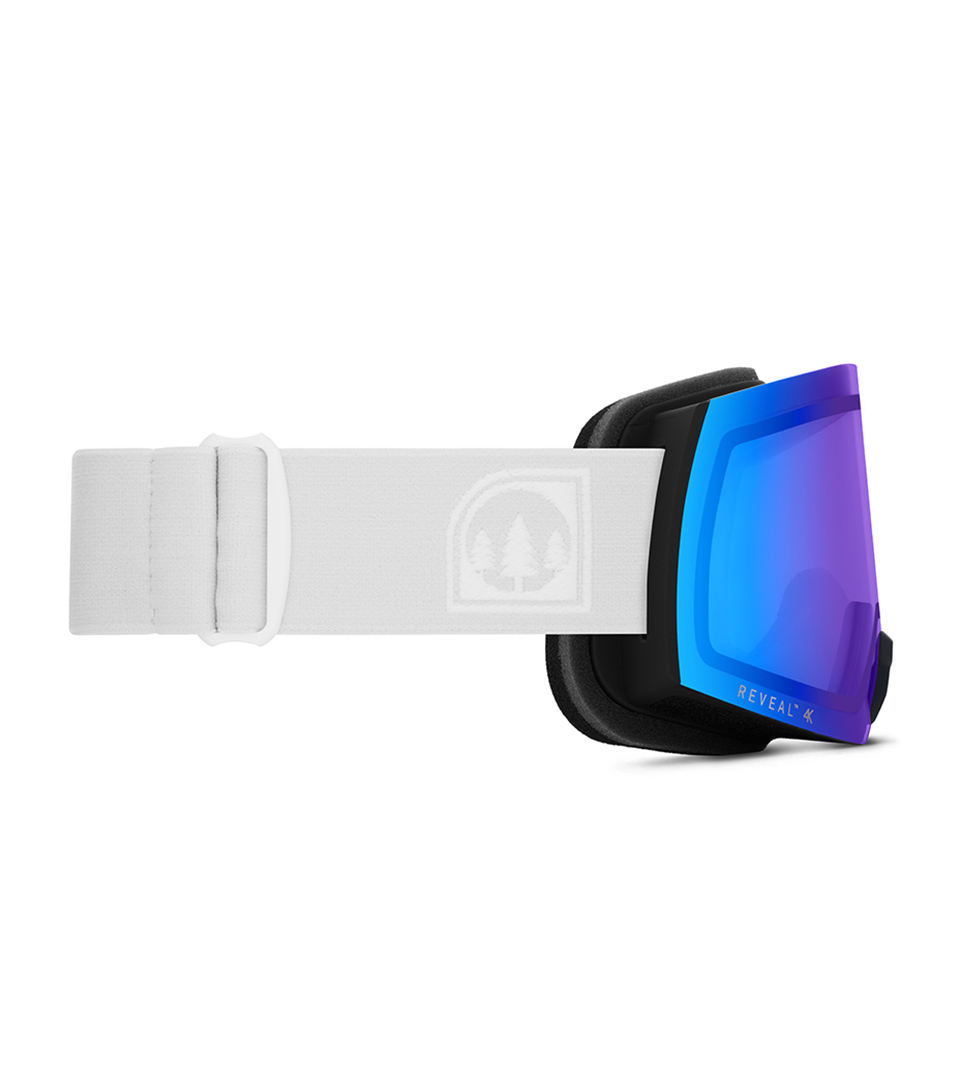 ski goggles with blue mirrored lens shown from side on white background for eyewear product photography
