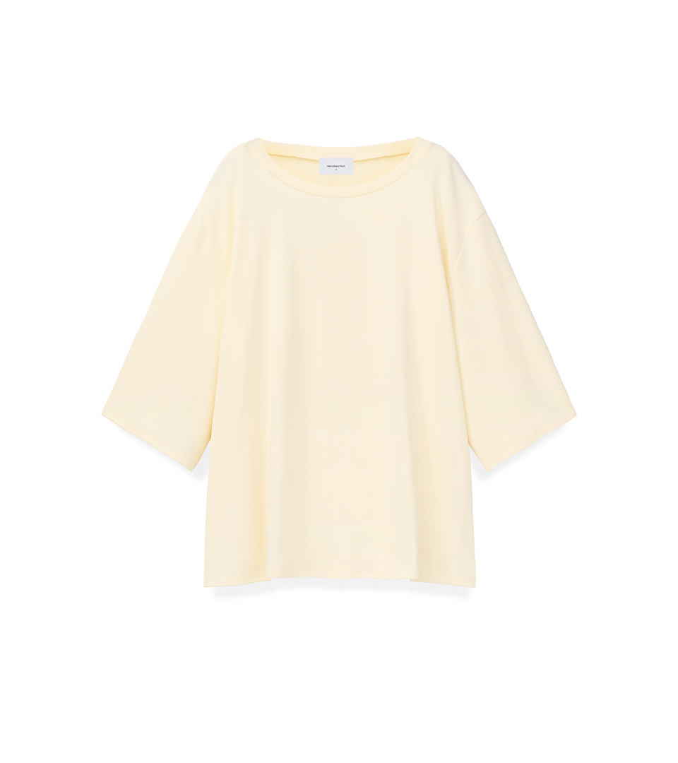 ghost mannequin light yellow oversized t-shirt on white background for flat lay product photography