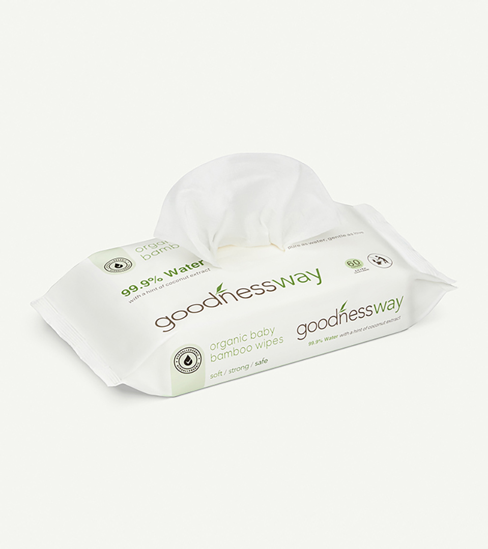 Goodnessway organic baby bamboo wipes. Open wipes pack with cotton tissue showing on a soft beige background for product photography.