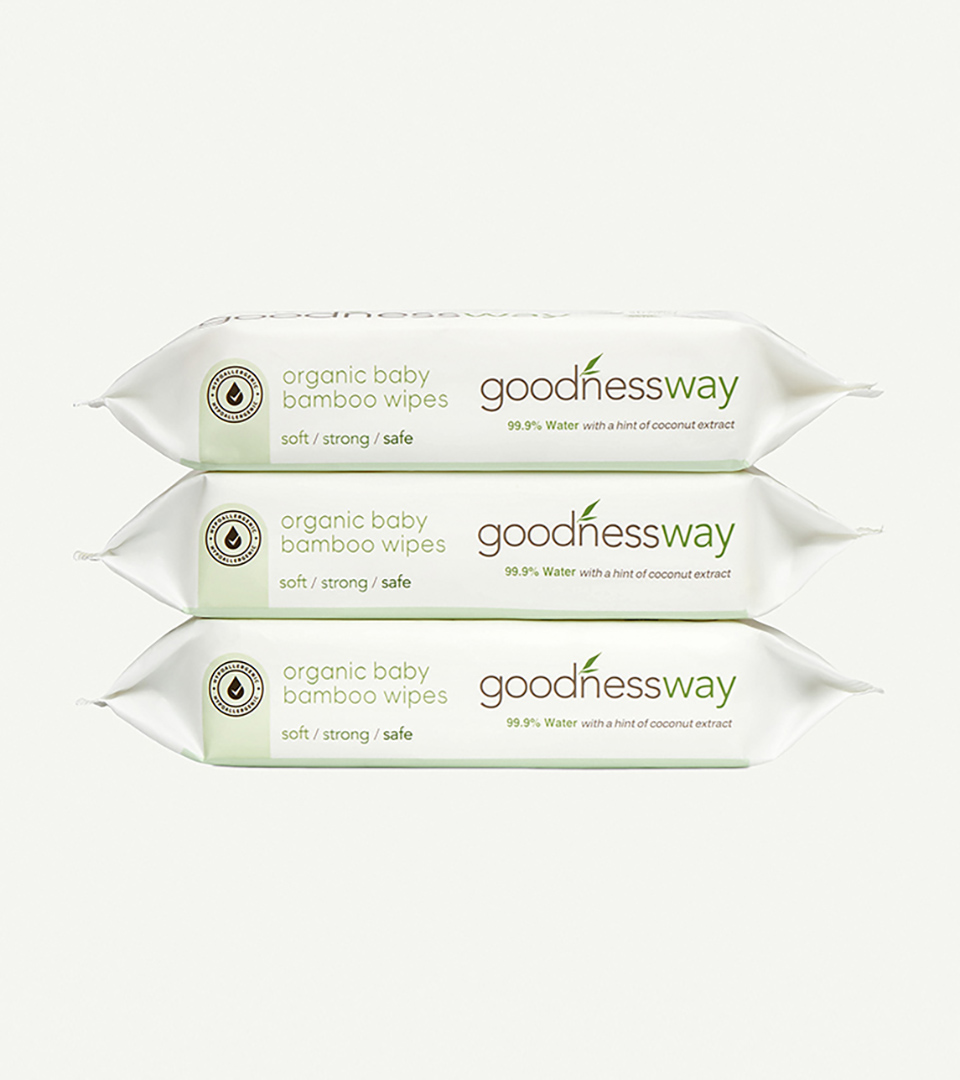 Product on white Amazon photography by Shootify. Three stacked Goodnessway organic baby bamboo wipes packs on a white background.