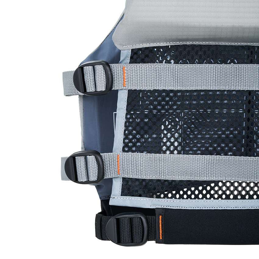 Close-up product photography of a life vest's side adjustment straps, buckles, and breathable mesh panel