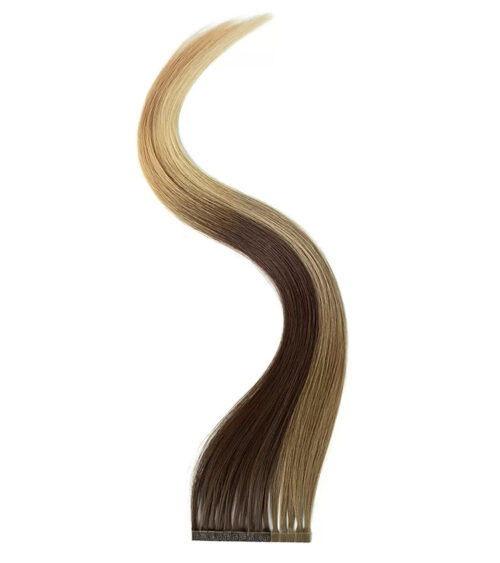 Hair extension photography of a single tape-in weft in an ombre blonde shade, styled in an S-curve to show movement.