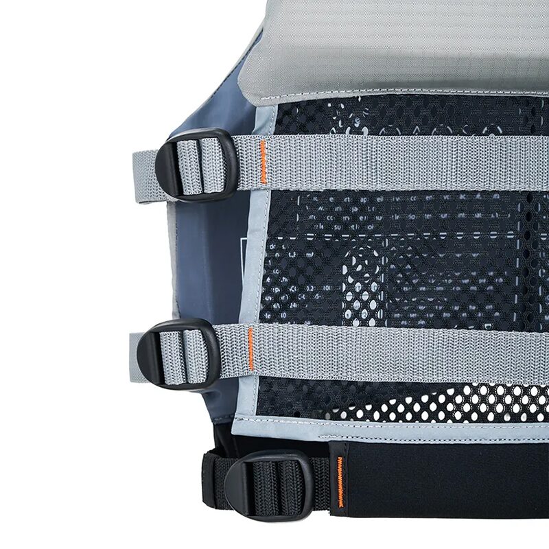 Macro detail photography of the webbing straps, sliders and mesh back panel of a grey paddle life vest