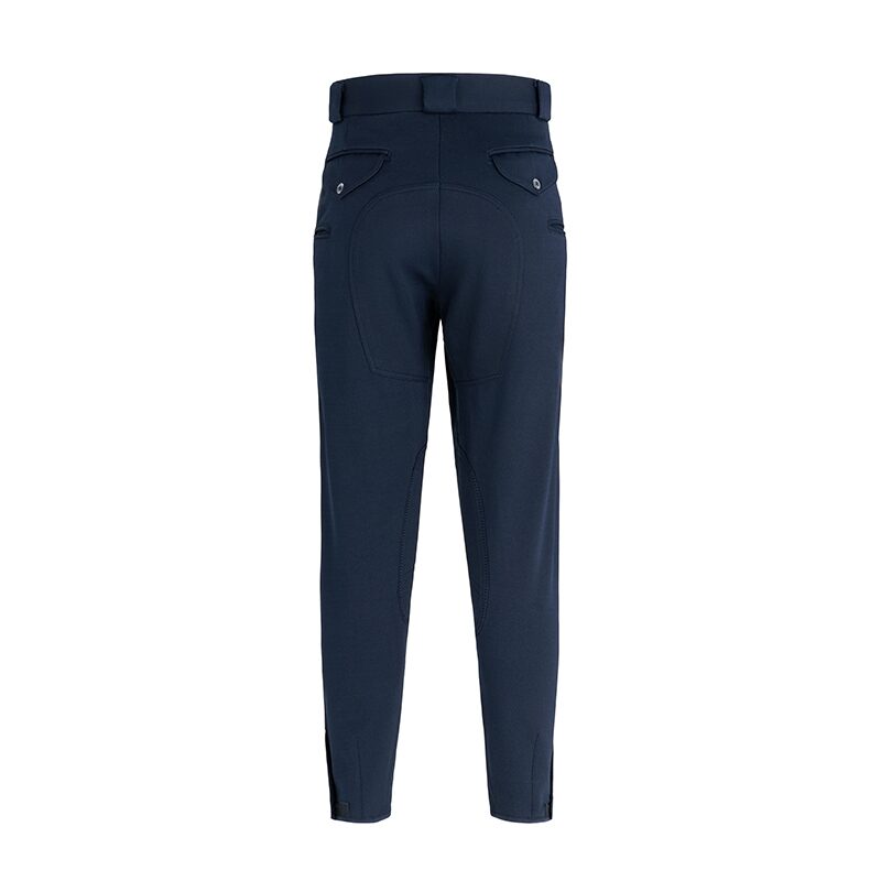 Flat lay product photography of navy riding breeches, back view showing welt pockets and seat panel