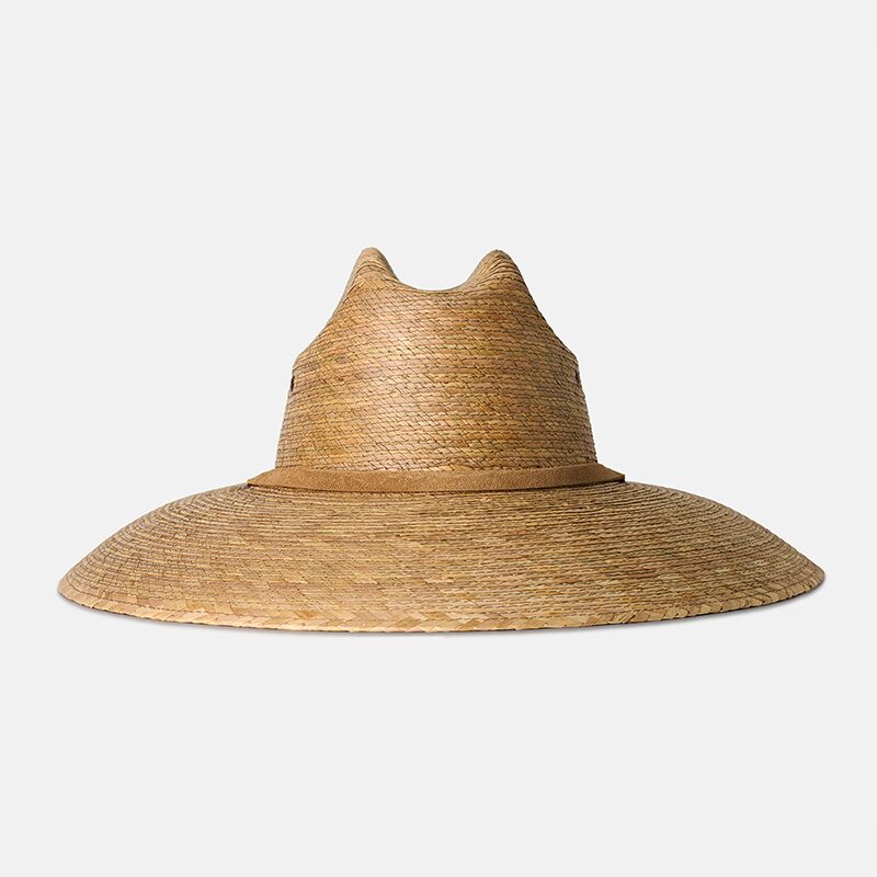 Product photography of a wide-brim woven straw lifeguard hat with a tan band, straight-on front view on white