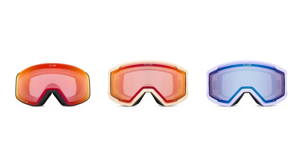 Three Glade ski goggles on white — red, cream and lavender frames with mirrored lenses
