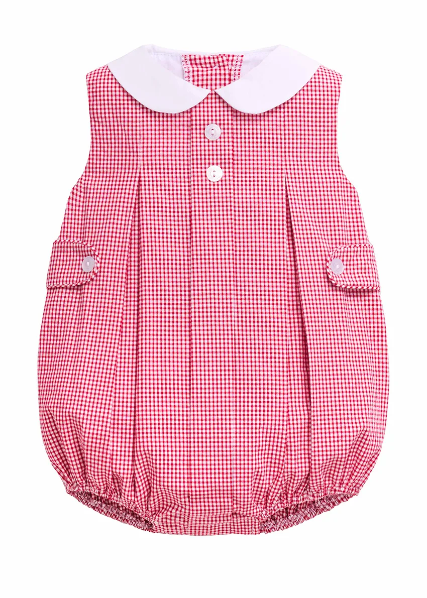 Red gingham baby bubble romper with white Peter Pan collar and buttoned tabs, styled flat lay on white