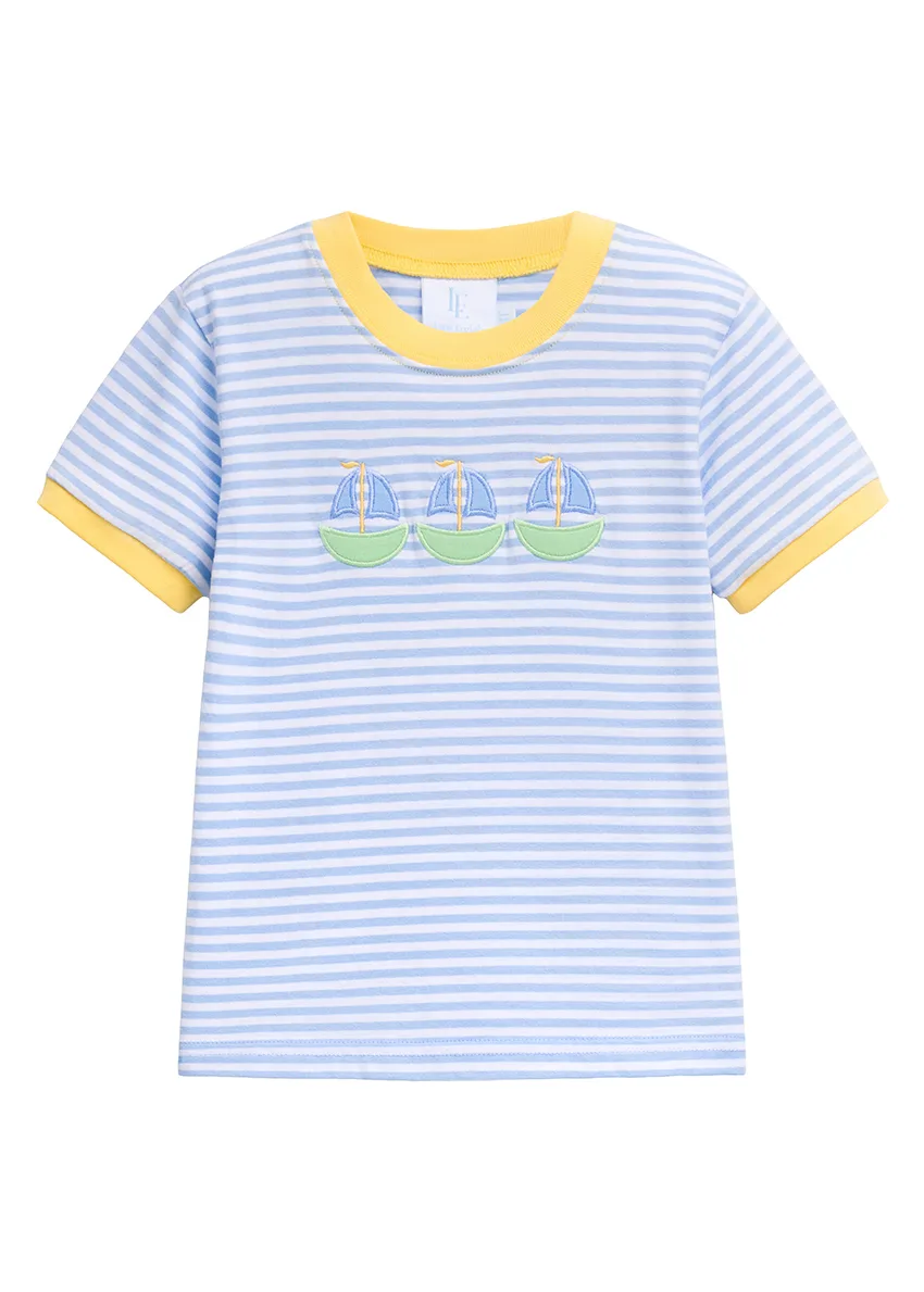 Blue and white striped children's t-shirt with yellow ringer trim and three appliqué sailboats, flat lay on white