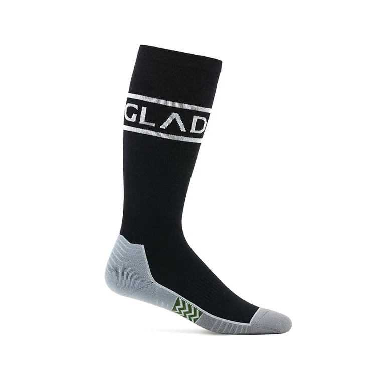 Black Glade ski sock with a white logo band and grey cushioned footbed, side view