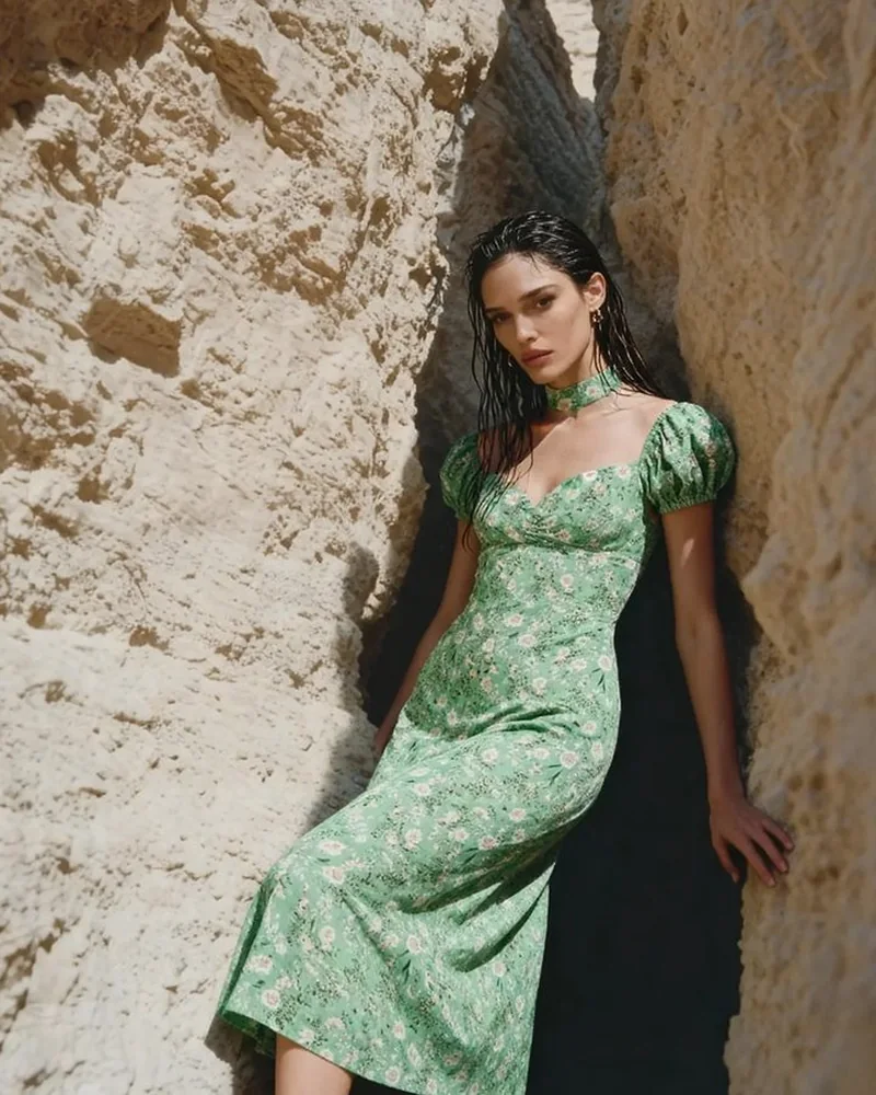 AI fashion model in a green floral midi dress