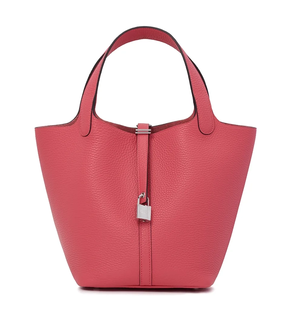 Bag photography of a pink leather bucket bag with a silver padlock