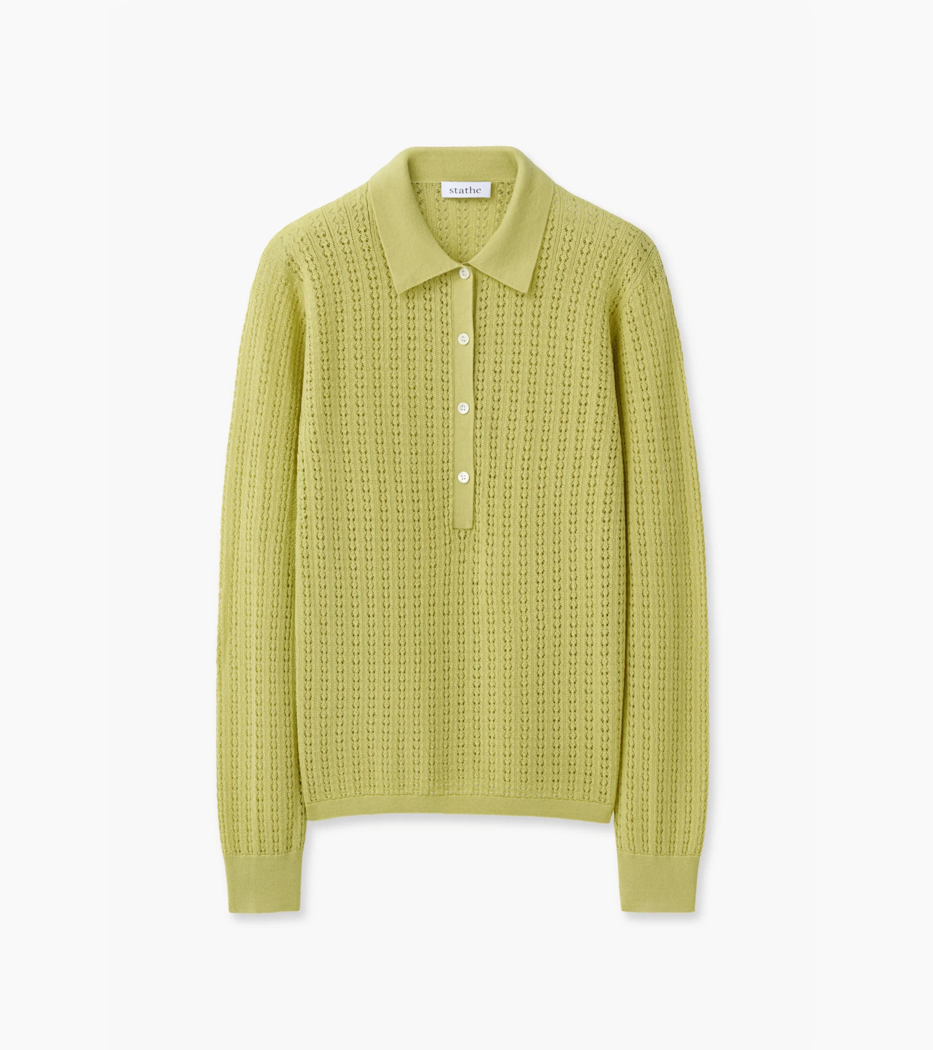 Flat lay photography of a lime pointelle knit polo sweater