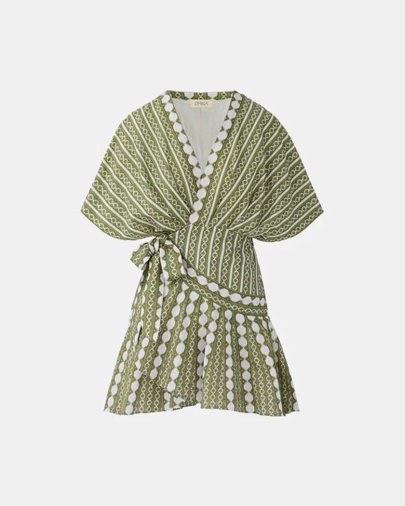 Ghost mannequin of a green and white print wrap mini dress