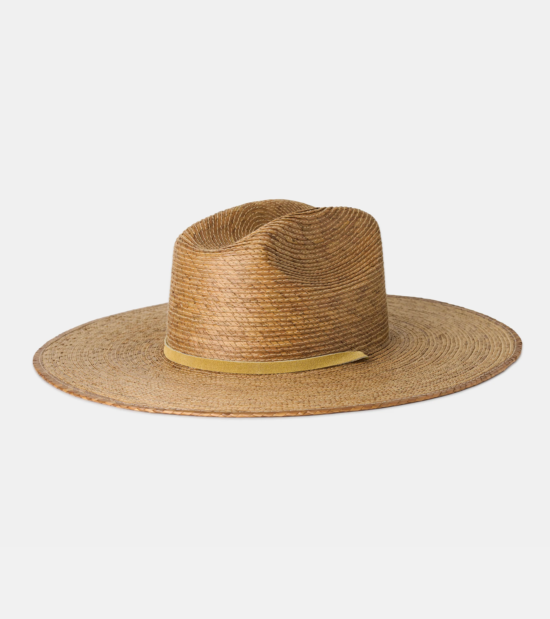 Hat photography of a straw wide-brim fedora with a suede band