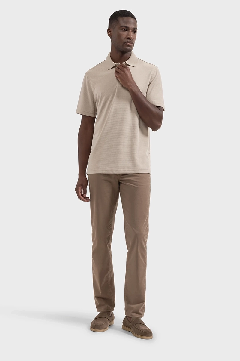 On-model photography of a men’s knit polo and chinos