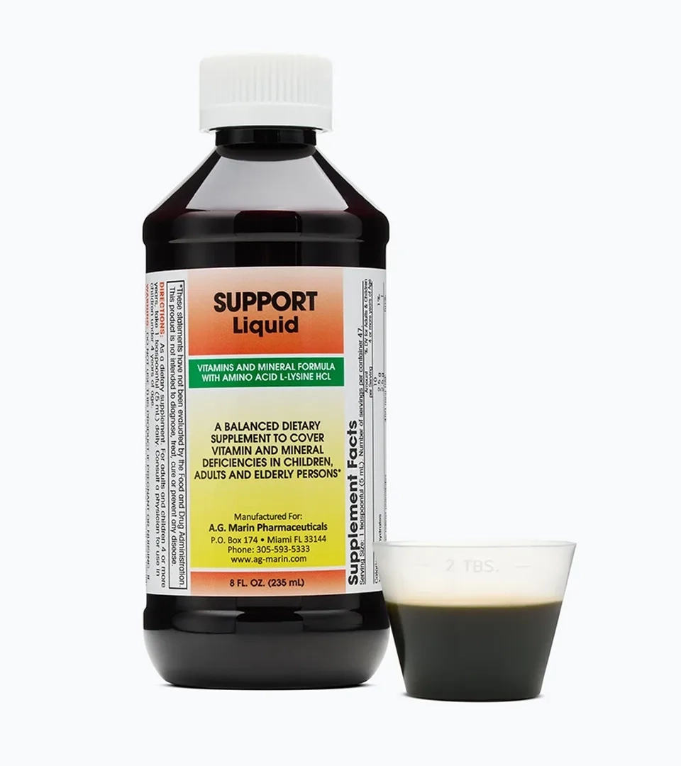 Supplement photography of a liquid vitamin and mineral supplement bottle with a dosing cup