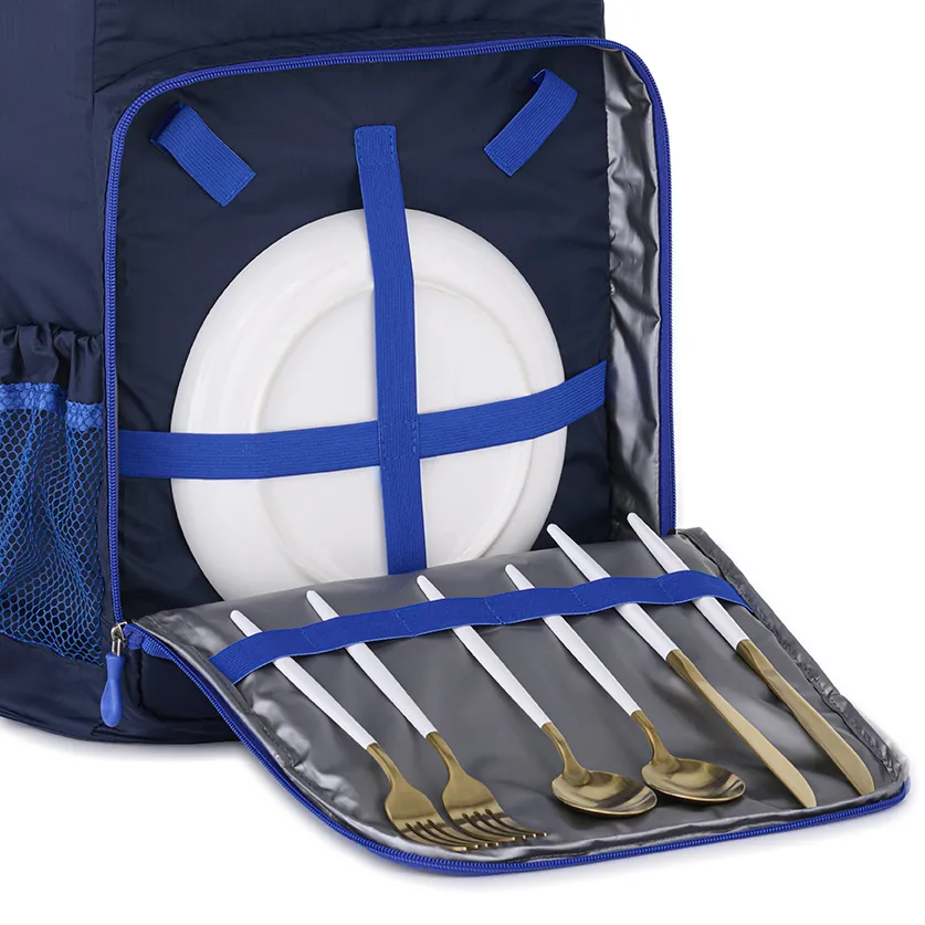 Amazon product photography of a picnic backpack open to show plates and cutlery set
