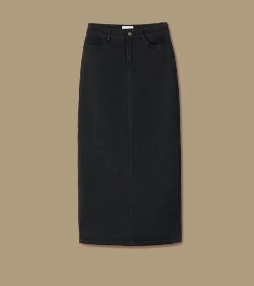 Flat lay photography of a black denim midi skirt photographed for apparel product photography.