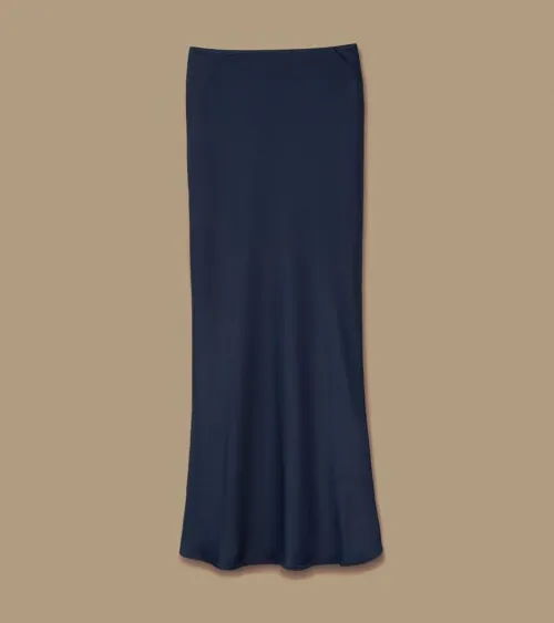 Flat lay photography of a navy maxi skirt for online retail fashion photography.