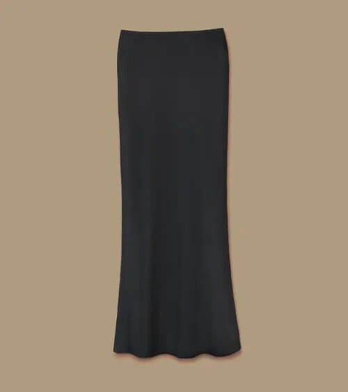 Flat lay photography of a black maxi skirt photographed for women's apparel e-commerce photography.