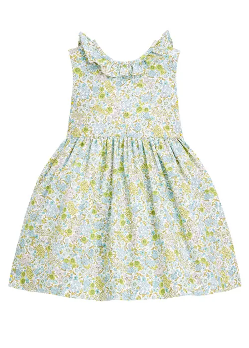 Flat lay photography of a floral girls dress photographed for children's apparel product photography.