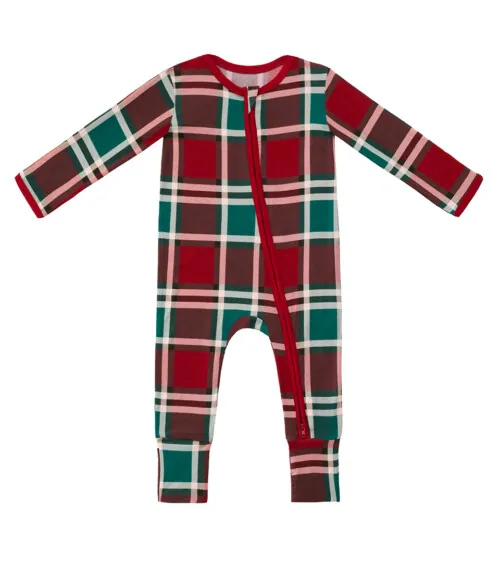 Flat lay photography of a plaid baby sleeper photographed for infant clothing product photography.