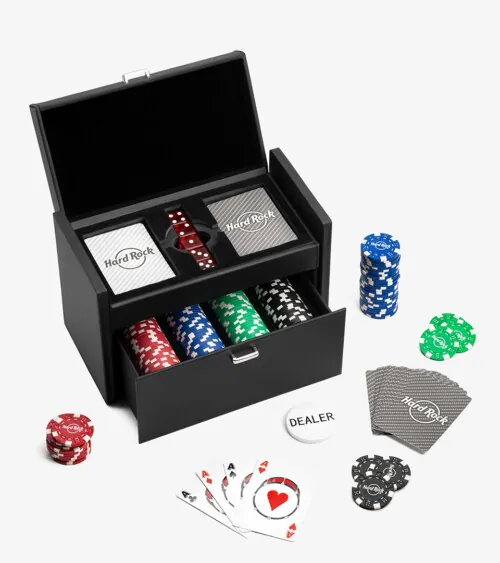 Open black game box set with poker chips, cards, and dealer button photographed overhead on white, studio product photography