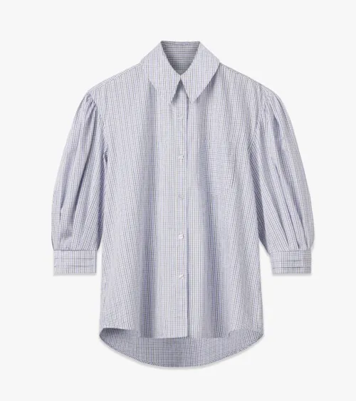 Flat lay photography of a striped women's blouse with gathered sleeves for apparel e-commerce photography.
