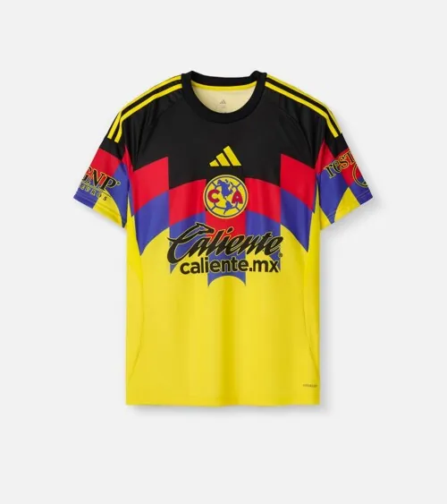 Flat lay photography of a yellow soccer jersey with multicolor graphic details for e-commerce apparel photography.