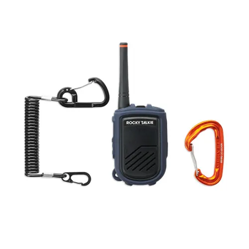Navy two-way radio with coiled tether and carabiners arranged on white background, studio product photography