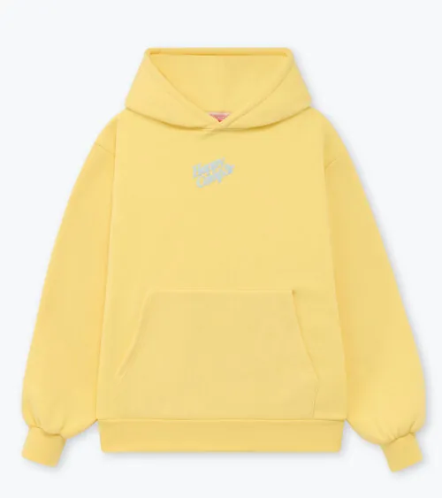 Flat lay photography of a yellow pullover hoodie on a clean white background for product photography.